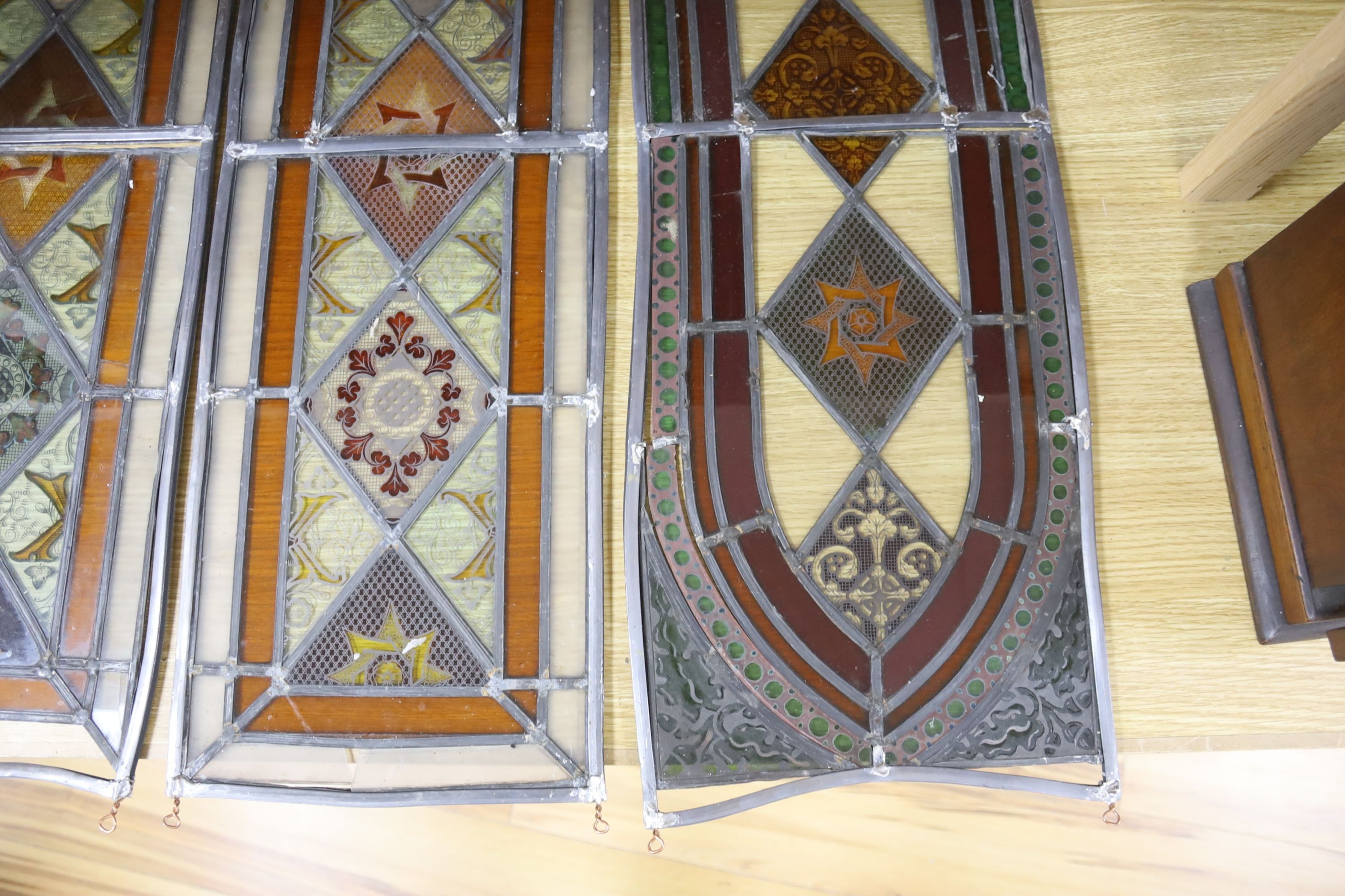 Four late 19th century stained and lead glass panels, 81 x 27cm